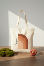 White cotton tote bag with terracotta arch print, front view with top handles
