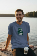 Blue crew-neck T-shirt with Reel Cool Dad graphic on the front