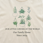 Natural t-shirt close-up with green botanical graphic and “Our Family Home,” “Since 2024”