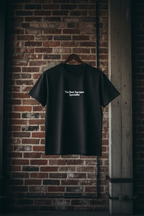 Custom text T-shirt in dark green with small chest print.