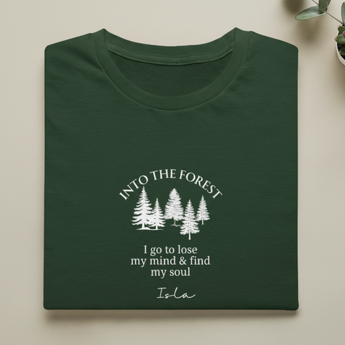 Personalised forest graphic T-shirt in forest green, trees print with name Isla