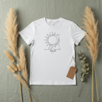 White crewneck graphic T-shirt with sun-and-moon emblem, tag attached.