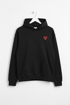 Black pullover hoodie on hanger with small red heart patch on upper chest