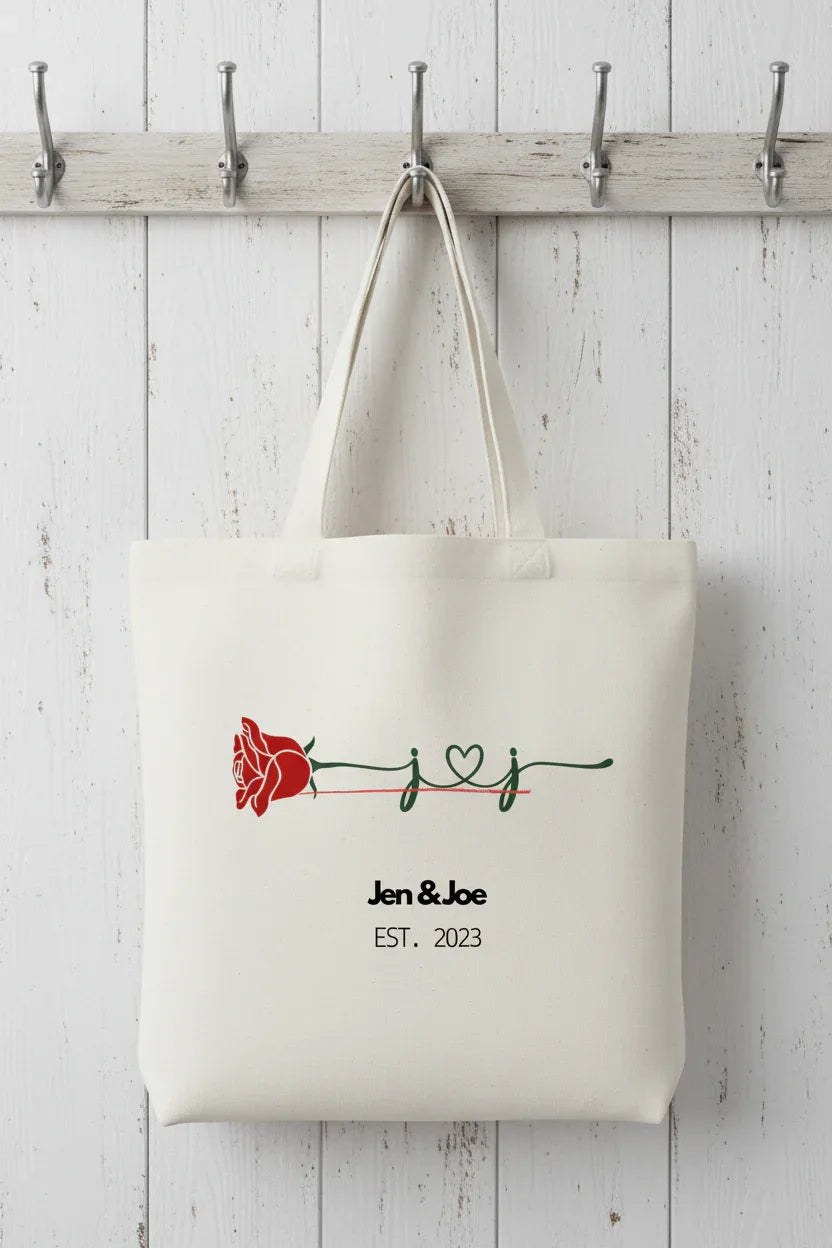 Cream tote bag with red rose and 'Jen & Joe' EST. 2023 print