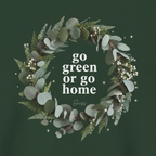 Forest green unisex T-shirt with “go green or go home” wreath graphic