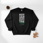 Black crewneck sweatshirt with “Keep Calm and Enjoy the waves” text and wave graphic.