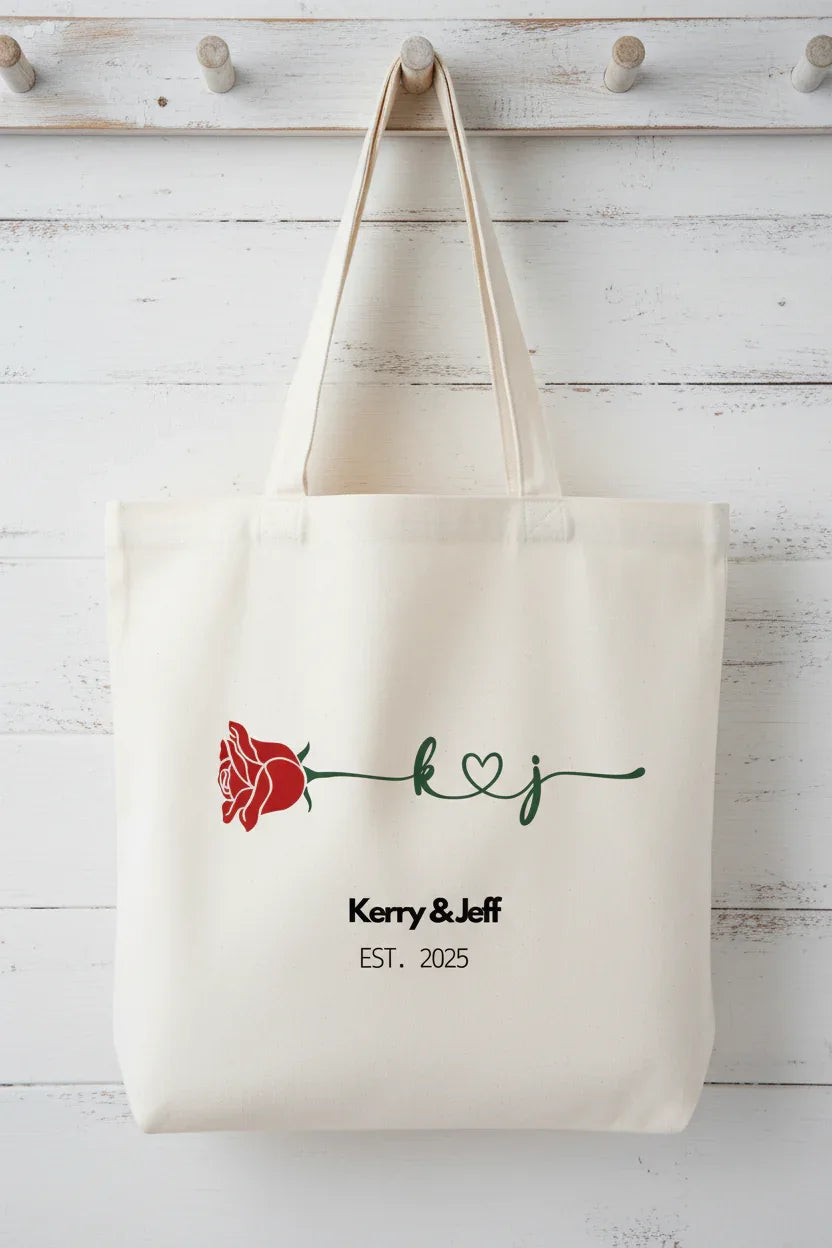 White personalized rose tote bag with red rose print and 'Kerry&Jeff' text
