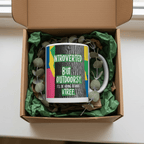 White mug with colorful nature quote shown in an open gift box