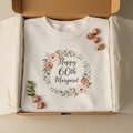 White birthday T-shirt with floral wreath 'Happy 60th Margaret'.