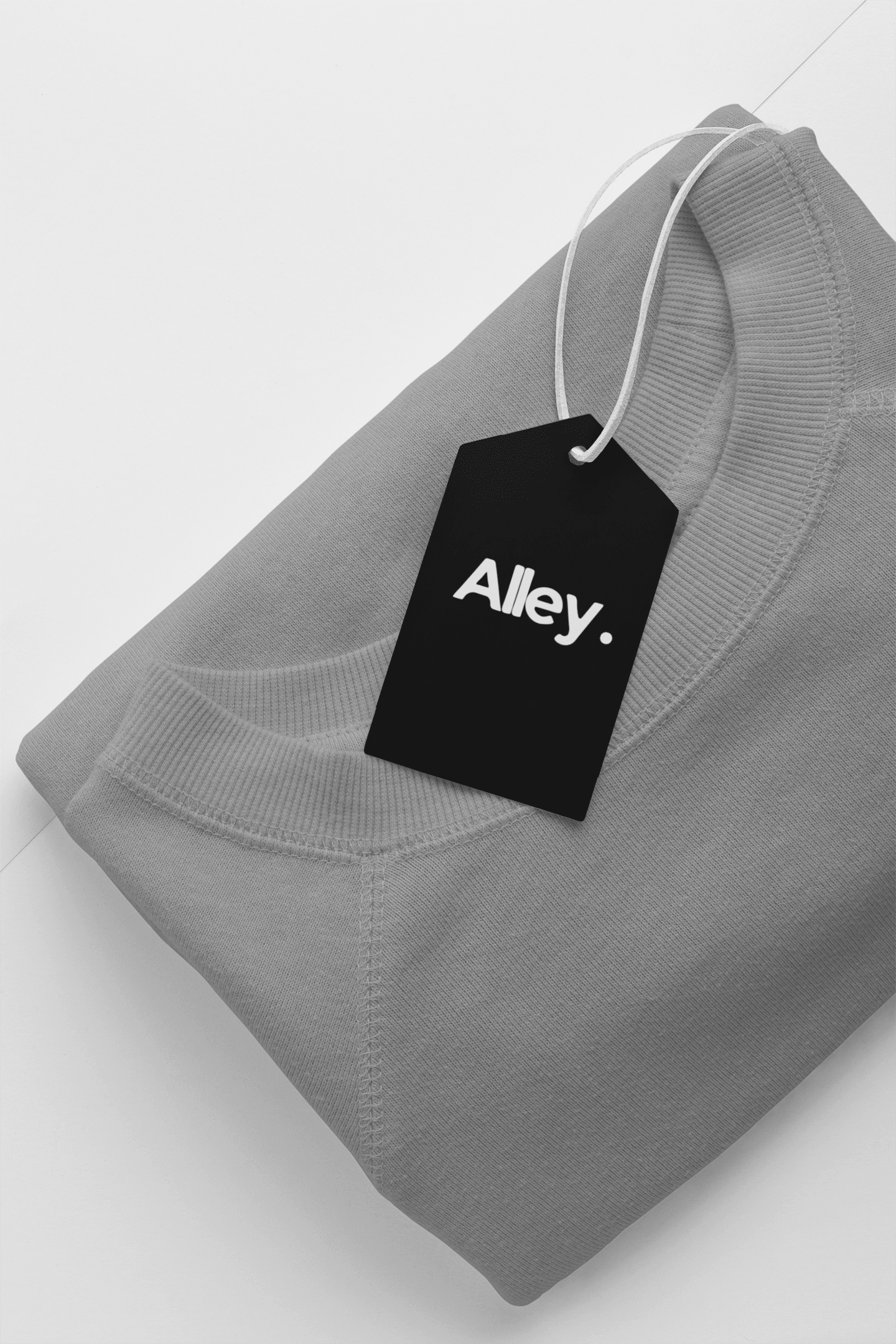 Charcoal crewneck sweatshirt with ribbed collar and cuffs, hanging black tag