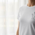White t-shirt with lavender sprig graphic and custom name and year on chest