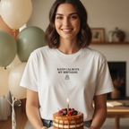 White crew-neck T-shirt with front graphic text "Keep Calm Its My Birthday"