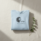 Light blue folded lion graphic hoodie with drawstring hood and kangaroo pocket