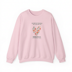 Light pink crewneck sweatshirt with floral heart graphic and Brighton text