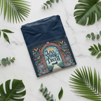 Graphic t-shirt flat lay: navy shirt with multicolor arch front print and script text.