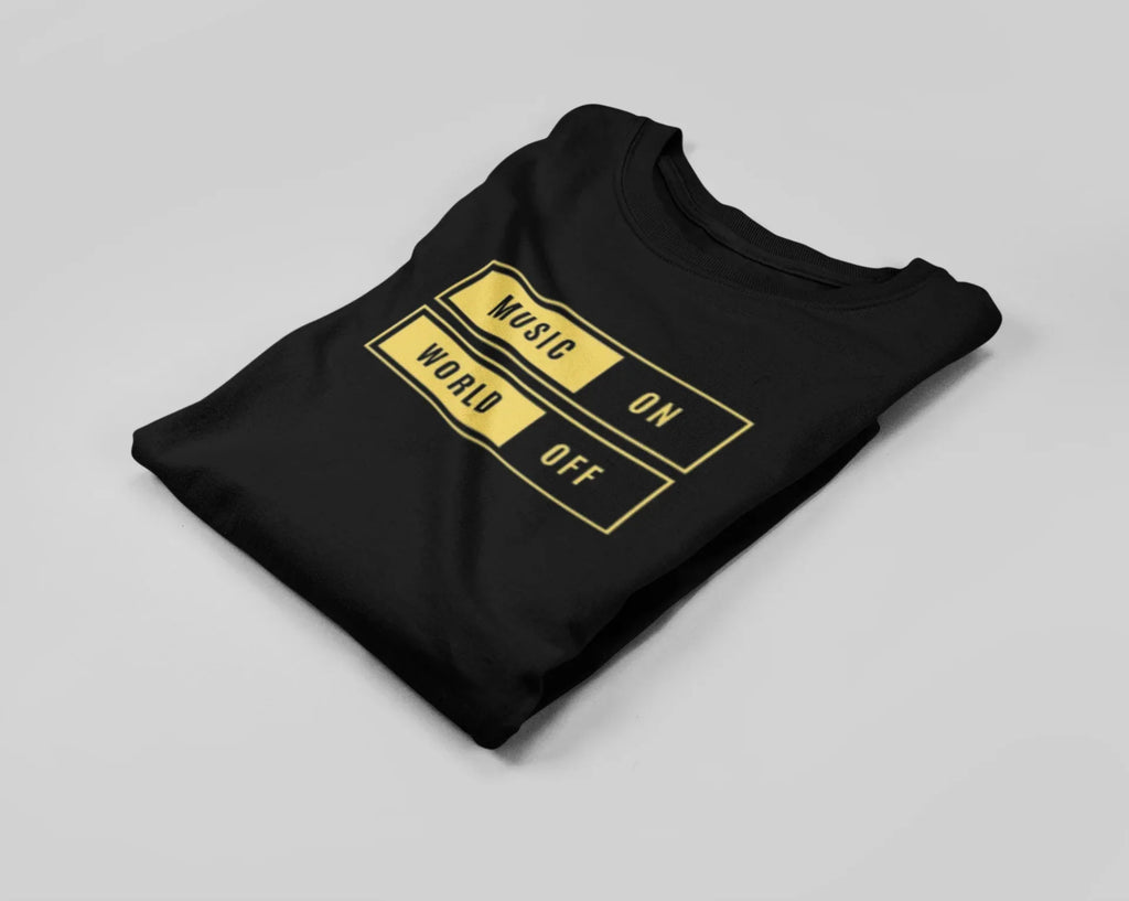 Folded black unisex graphic T-shirt with “MUSIC ON” and “WORLD OFF” box print