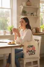 White tote bag with “Love you much” heart print, name LUCY