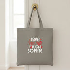 Grey tote bag with printed hearts and text: “LOVE YOU MUCH SOPHIE”