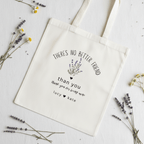 Cream tote bag laid flat with “There’s No Better Friend” and “than you” text