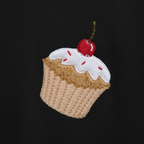 Embroidered cupcake motif on black sweatshirt fabric