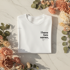 White T-shirt with 'I have two names' print and small heart graphic, crew neck.