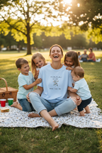 Light blue floral mama T-shirt worn outdoors, 'mama est. 2015' print