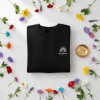 Black sweatshirt with embroidered rainbow arch and name patch, crew neck