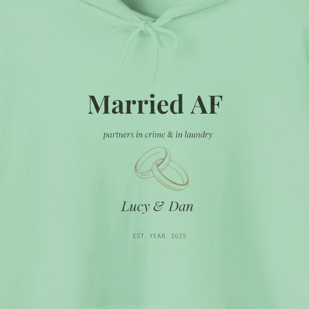 Mint green hoodie with “Married AF” text, partner line, ring graphic