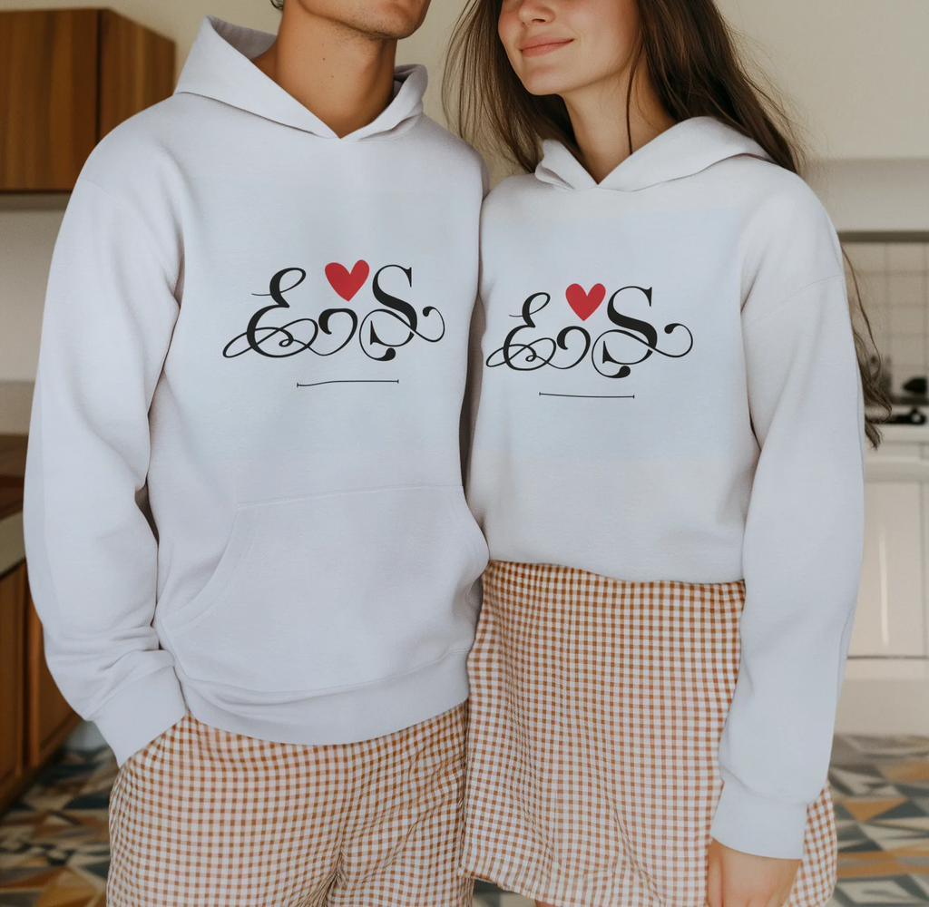 White couples hoodie set with heart monogram graphic on chest, front view