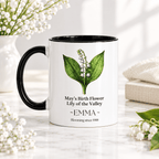 Personalised birth flower mug with black handle; May lily of the valley; name EMMA.