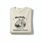 Ivory T-shirt with black 'Mentally Sleeping in a Forest' mountain forest graphic front
