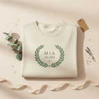 Mia est. 2025 — Styled flat lay with botanicals