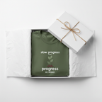 Military green motivational t-shirt with centered plant and “progress EST. PATIENCE” slogan