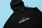 Black hoodie sweatshirt with kangaroo pocket, 'Caffeine, Chaos, and Cuddles' chest graphic