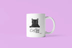 Coffee break mug in white with black cat graphic and “Coffee Break” text; angled view.