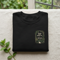 Black sweatshirt with plant graphic on the chest and crew neck