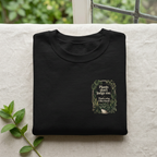 Black sweatshirt with plant graphic on the chest and crew neck
