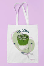 White matcha tote bag with long handles and green drink illustration