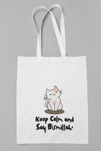 White cotton tote bag with cat graphic and slogan “Keep Calm and Say Bismillah!”