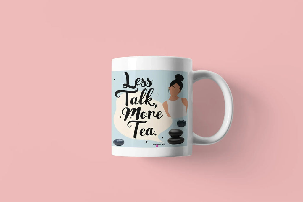 White tea mug with 'Less Talk, More Tea' graphic and stone design on pink