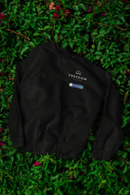 Black sweatshirt back side with Freedom logo and badge on chest