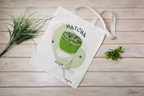 White tote bag with matcha drink illustration and long loop handles