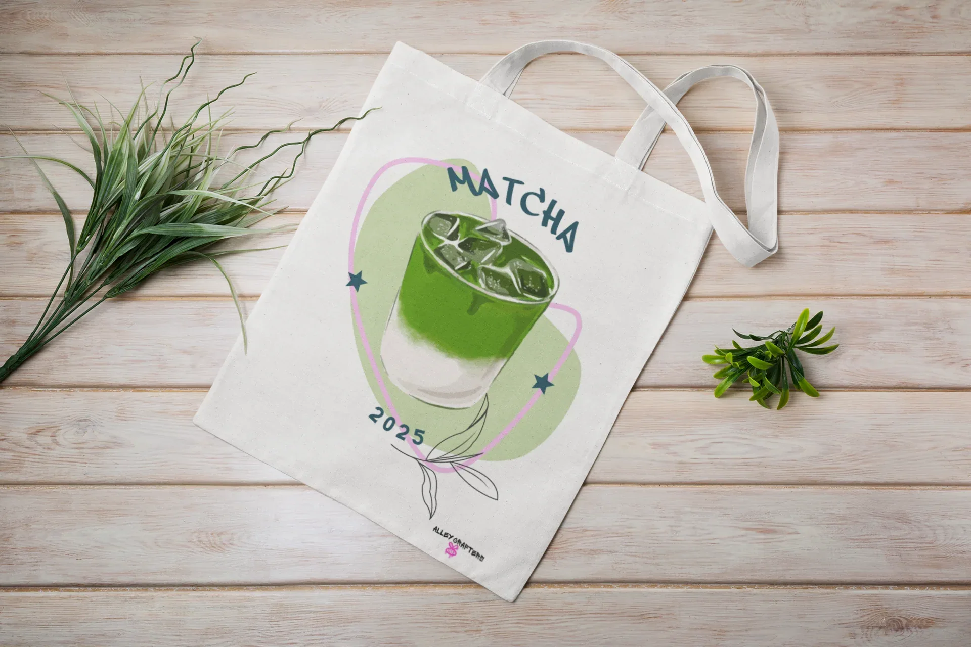 White tote bag with matcha drink illustration and long loop handles
