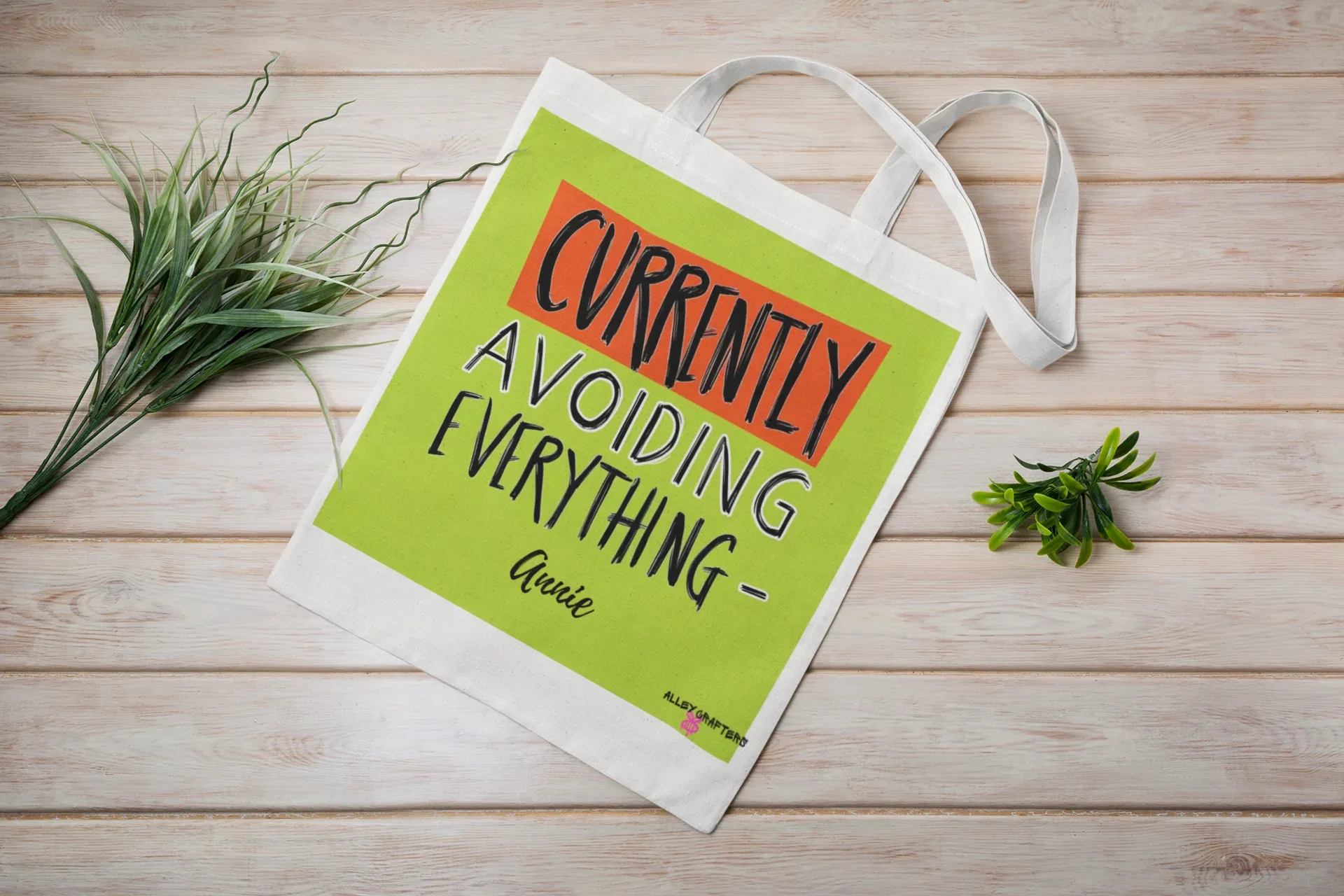 White canvas tote bag with lime green front panel and 'Currently Avoiding Everything-' print, Lysa