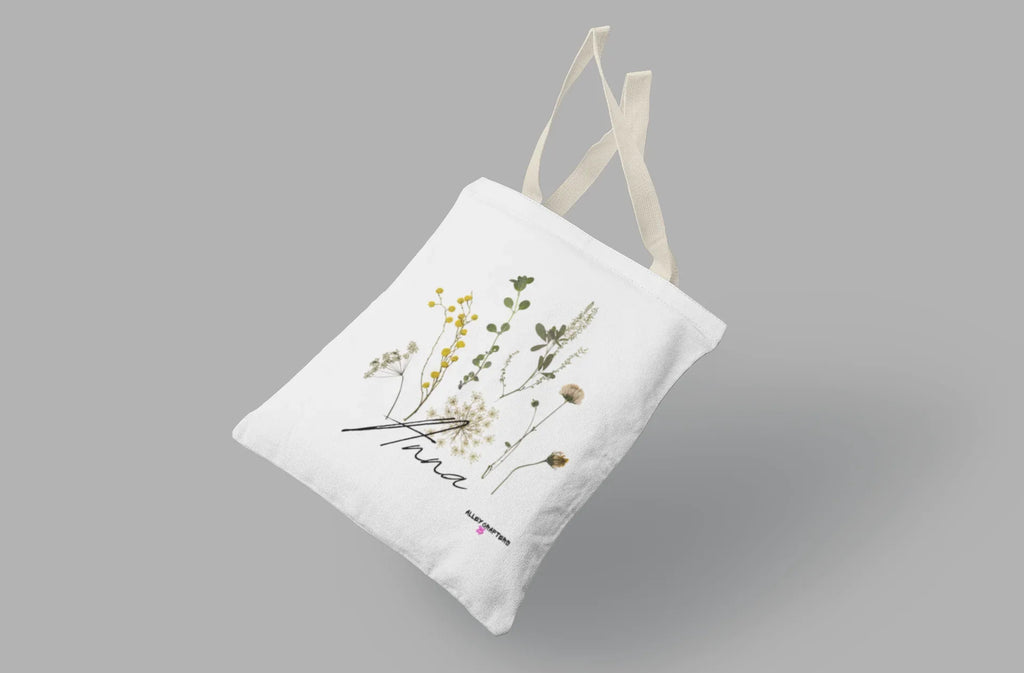 White tote bag with botanical wildflower print, long fabric handles
