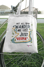White tote bag with colorful quote graphic and loop handles