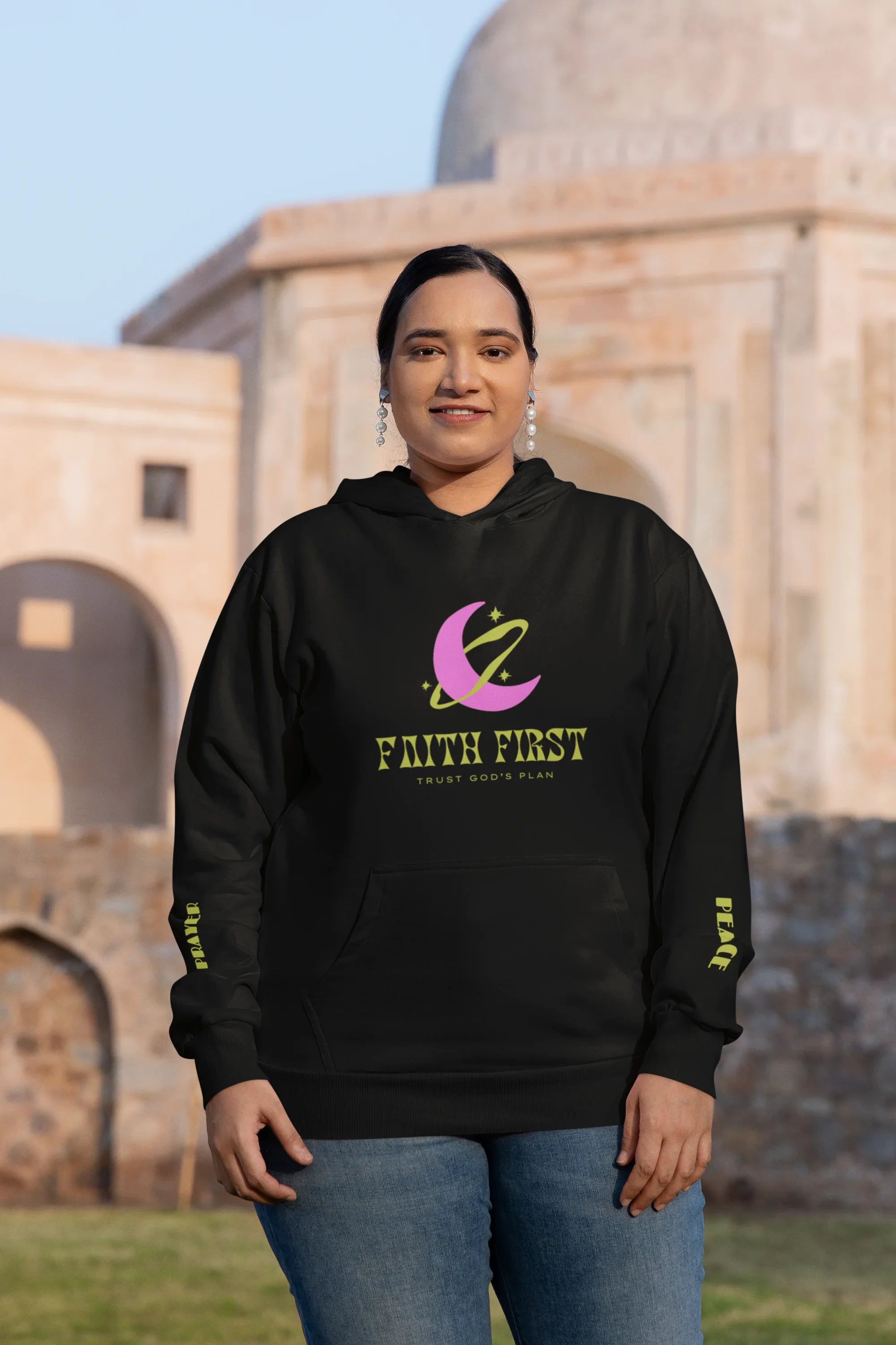 Black unisex hoodie with Faith First logo on front and long sleeves