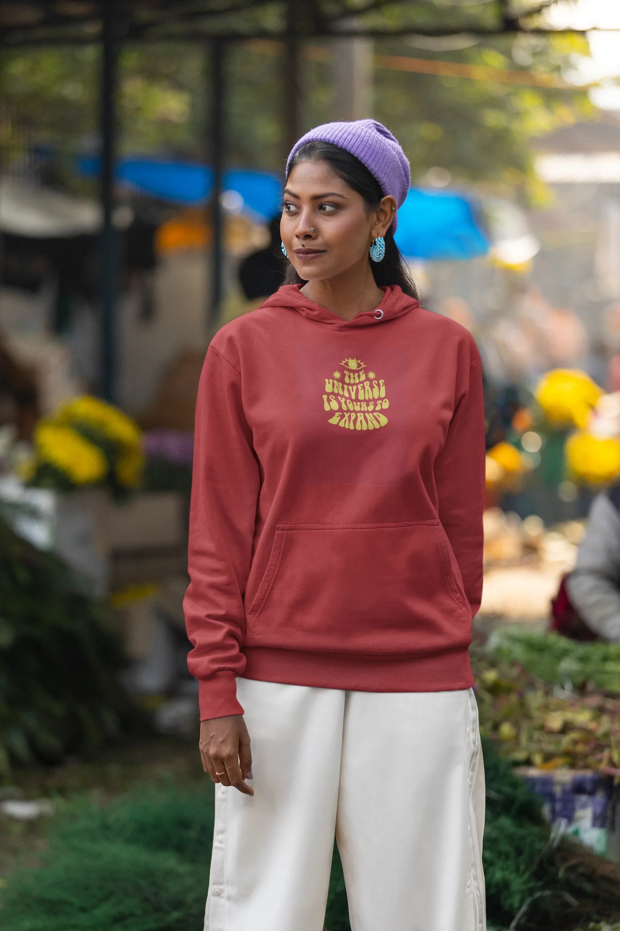 Red unisex hoodie with drawstring hood and chest graphic