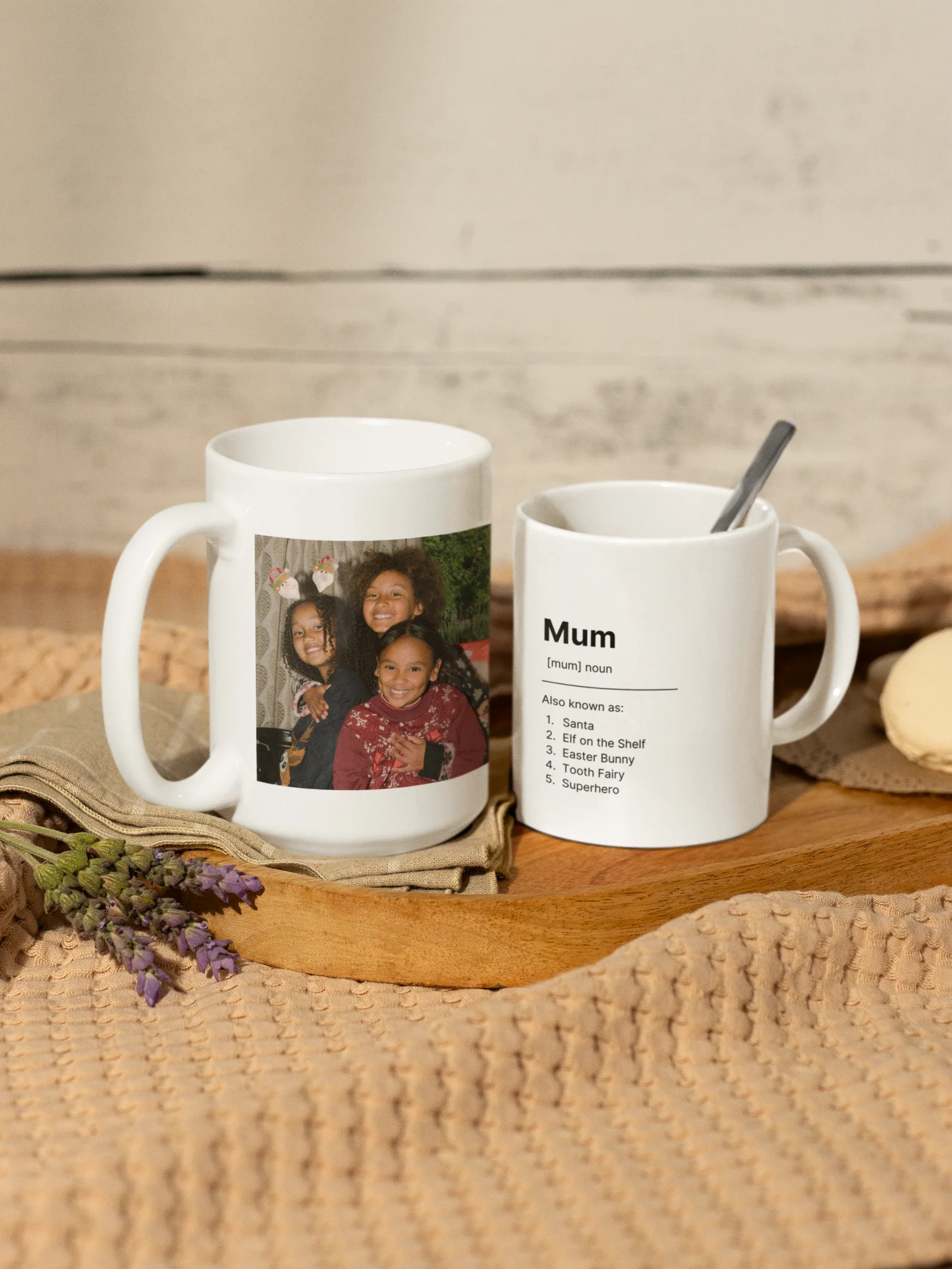 White ceramic mug with custom family photo on front beside matching “Mum” mug