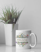 White mug with floral design, 'Finley & Ava' and 'October 3rd, 2023'